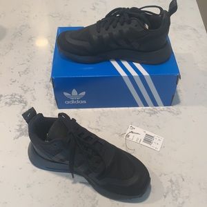 Brand new adidas all black sneakers
